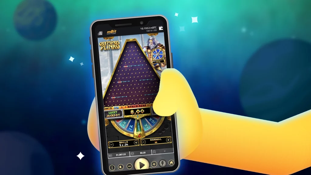 Close-up of a hand holding a phone displaying Olympus Plinko with a purple pyramid, Greek god Zeus, and jackpot wheel.